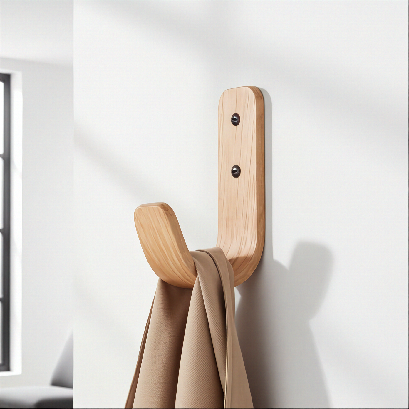 Curved oak wall hooks for entryway - handcrafted British made wooden coat hooks showing natural grain and premium finish